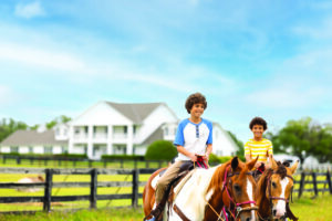Family Horseback Riding at Southfork Ranch - HIGH RES FOR PRINT - Texas Hotel and Lodging