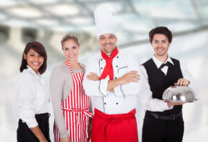 Group Of Happy Restaurant Chef And Waiters Standing Together